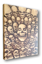 40 Skulls (wood print | black on a wood background)