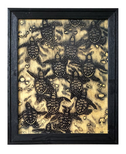 Baby Sea Turtles (wood print | black on a wood background)